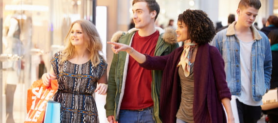 group of friends shopping in a mall