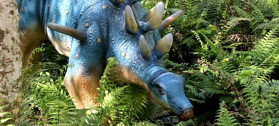 a life-sized stegosaurus statue at Dinosaur World in Tampa