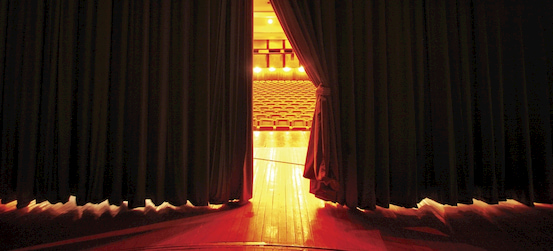 backstage looking out across the audience seating at the Tampa Theatre